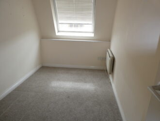 Centrally located top floor flat with parking | 2 bedroom