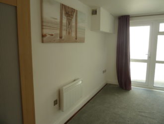 First floor studio apartment with balcony on outskirts of town