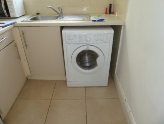 First floor studio apartment with balcony on outskirts of town